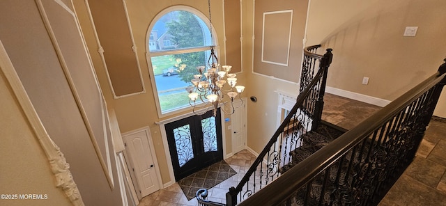 7 Quaker Hill Rd, Jackson, NJ 08527 - entryway with plenty of natural light, stairs, a chandelier, french doors, and a towering ceiling