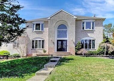 7 Quaker Hill Rd, Jackson, NJ 08527 - traditional home featuring a front yard and french doors