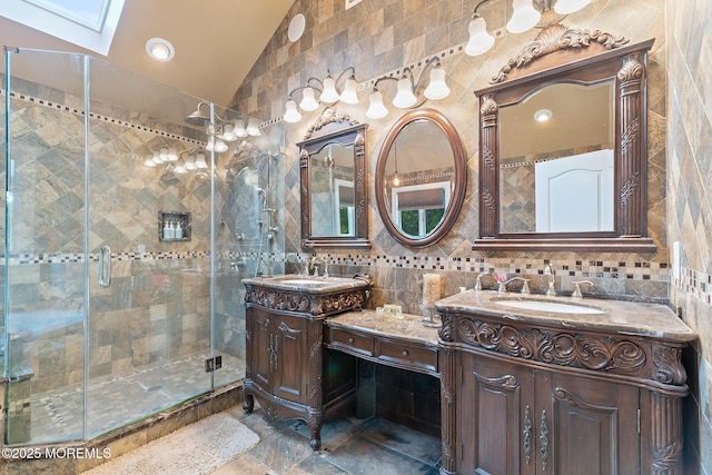 7 Quaker Hill Rd, Jackson, NJ 08527 - bathroom featuring a skylight, lofted ceiling, two vanities, tile walls, and a shower stall
