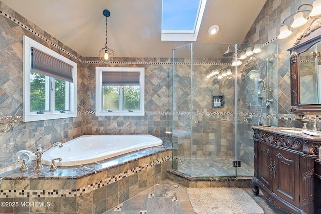 7 Quaker Hill Rd, Jackson, NJ 08527 - full bathroom with vanity, lofted ceiling, tile walls, a garden tub, and a stall shower