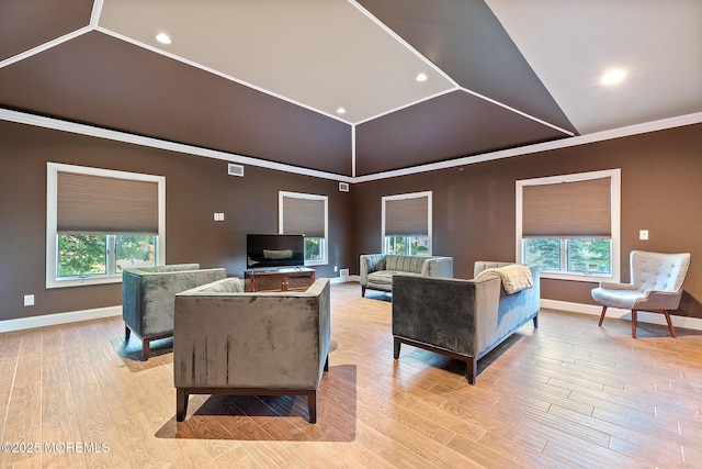7 Quaker Hill Rd, Jackson, NJ 08527 - living area featuring healthy amount of natural light, vaulted ceiling, light wood-style floors, and crown molding