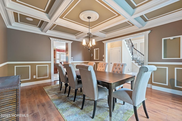 7 Quaker Hill Rd, Jackson, NJ 08527 - dining space with ornamental molding, coffered ceiling, hardwood / wood-style flooring, stairs, and a decorative wall