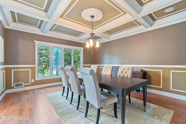 7 Quaker Hill Rd, Jackson, NJ 08527 - dining space featuring coffered ceiling, a chandelier, ornamental molding, hardwood / wood-style flooring, and beamed ceiling