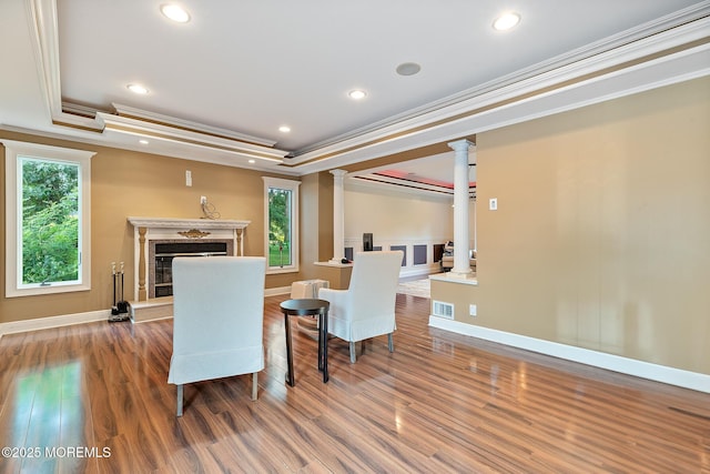 7 Quaker Hill Rd, Jackson, NJ 08527 - sitting room with decorative columns, a tray ceiling, crown molding, healthy amount of natural light, and wood finished floors