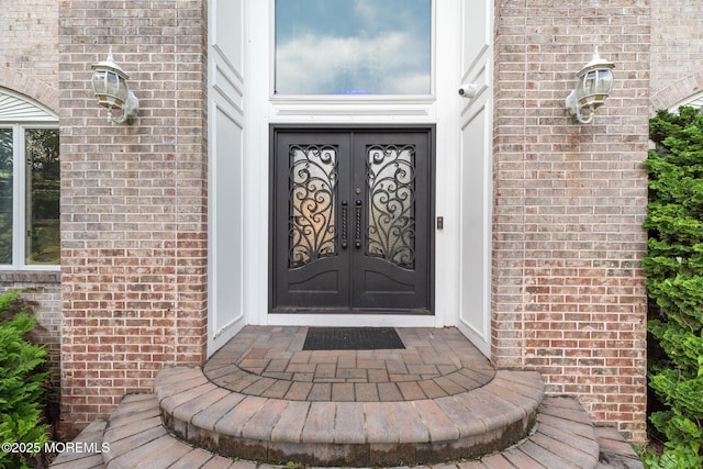 7 Quaker Hill Rd, Jackson, NJ 08527 - property entrance featuring french doors and brick siding