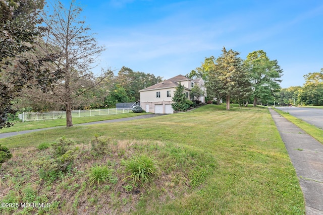 7 Quaker Hill Rd, Jackson, NJ 08527 - view of yard with an attached garage and asphalt driveway