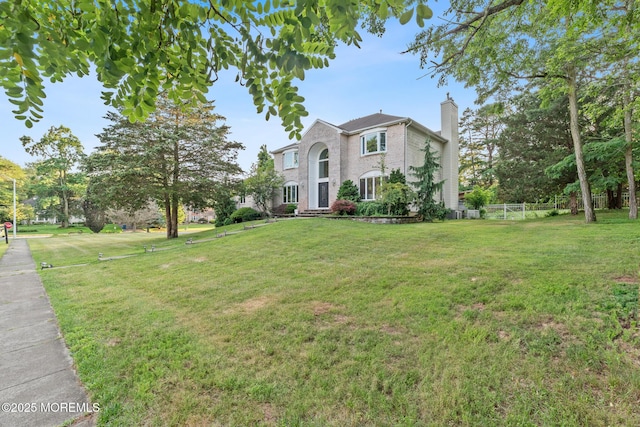 7 Quaker Hill Rd, Jackson, NJ 08527 - view of front of property with a chimney and brick siding