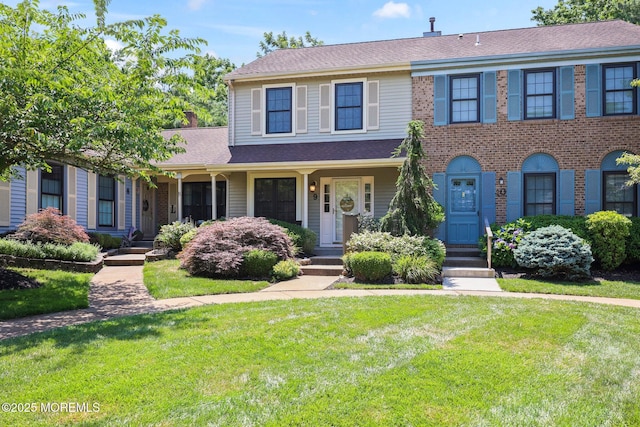 11 Interlaken Ct Unit 9, Freehold, NJ 07728 - view of front of house featuring a front lawn and a shingled roof