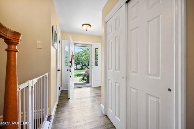 11 Interlaken Ct Unit 9, Freehold, NJ 07728 - hall with wood finished floors and baseboards