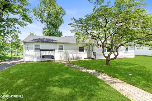 367 Kirby Ave, Long Branch, NJ 07740 - view of front facade featuring a front yard and a shingled roof