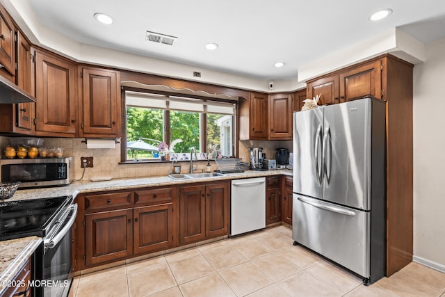367 Kirby Ave, Long Branch, NJ 07740 - kitchen featuring stainless steel appliances, backsplash, light tile patterned flooring, recessed lighting, and light stone countertops