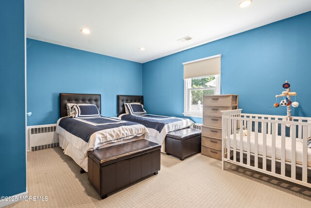 367 Kirby Ave, Long Branch, NJ 07740 - bedroom with radiator, carpet flooring, and recessed lighting