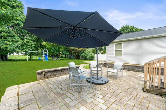 367 Kirby Ave, Long Branch, NJ 07740 - fenced backyard featuring a patio and a playground