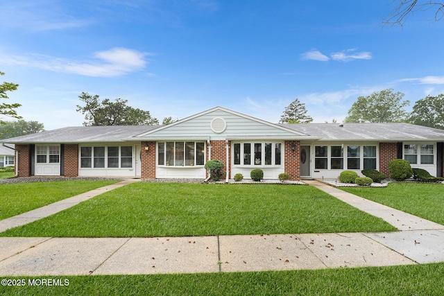 1058A Argyll Cir, Lakewood, NJ 08701 - ranch-style home featuring brick siding and a front yard