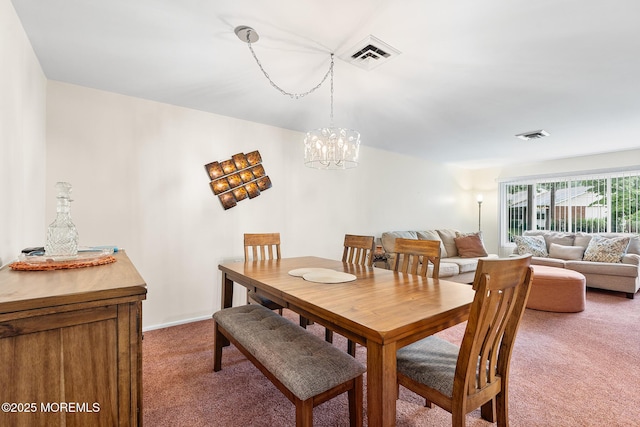 1058A Argyll Cir, Lakewood, NJ 08701 - dining area featuring light carpet and a chandelier