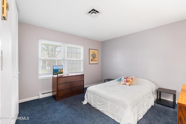 1058A Argyll Cir, Lakewood, NJ 08701 - carpeted bedroom featuring a baseboard heating unit and baseboards