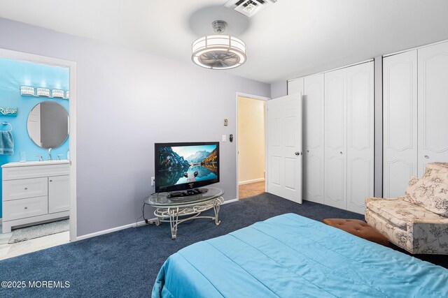 1058A Argyll Cir, Lakewood, NJ 08701 - carpeted bedroom featuring ensuite bath and two closets