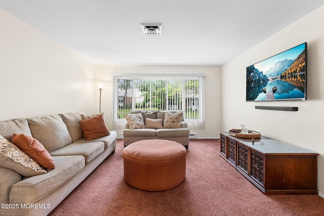 1058A Argyll Cir, Lakewood, NJ 08701 - carpeted living area featuring a baseboard heating unit and baseboards