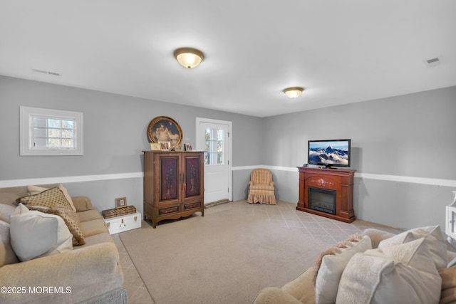 5-4 Main St, Oceanport, NJ 07757 - living area with tile patterned flooring and a glass covered fireplace