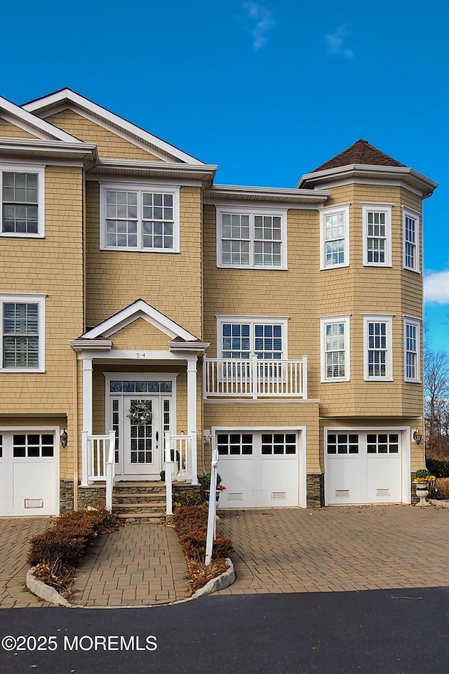 5-4 Main St, Oceanport, NJ 07757 - shingle-style home with decorative driveway and a garage