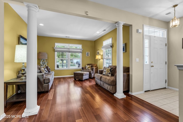 110 Rolling Meadows Blvd S, Ocean Twp, NJ 07712 - living area with decorative columns, wood finished floors, and recessed lighting