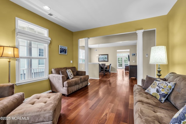 110 Rolling Meadows Blvd S, Ocean Twp, NJ 07712 - living room featuring decorative columns, hardwood / wood-style flooring, and recessed lighting