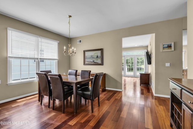 110 Rolling Meadows Blvd S, Ocean Twp, NJ 07712 - dining space with dark wood finished floors and a chandelier