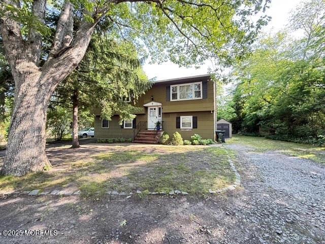 626 N County Line Rd, Jackson, NJ 08527 - raised ranch with a storage shed