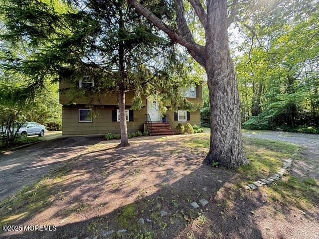 626 N County Line Rd, Jackson, NJ 08527 - view of property hidden behind natural elements