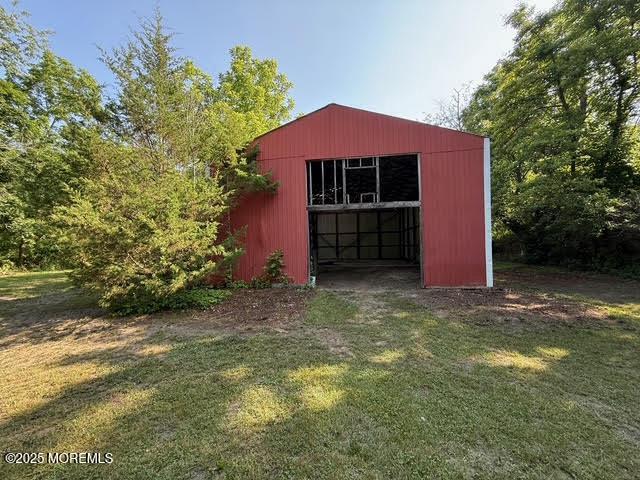 626 N County Line Rd, Jackson, NJ 08527 - view of pole building with a lawn