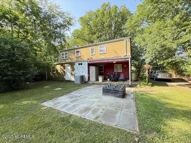 626 N County Line Rd, Jackson, NJ 08527 - rear view of house featuring a yard and a patio