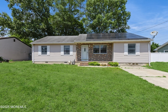 214 Conifer Dr, Forked River, NJ 08731 - view of front of property featuring solar panels, crawl space, and brick siding