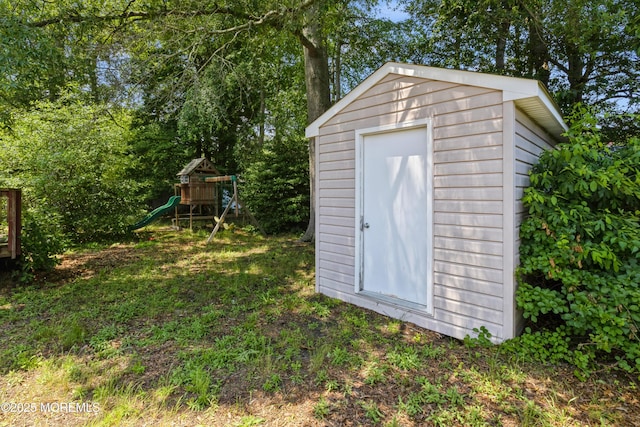 214 Conifer Dr, Forked River, NJ 08731 - view of shed featuring a playground