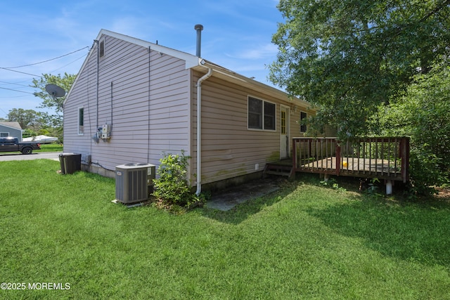 214 Conifer Dr, Forked River, NJ 08731 - view of property exterior featuring a deck and a lawn