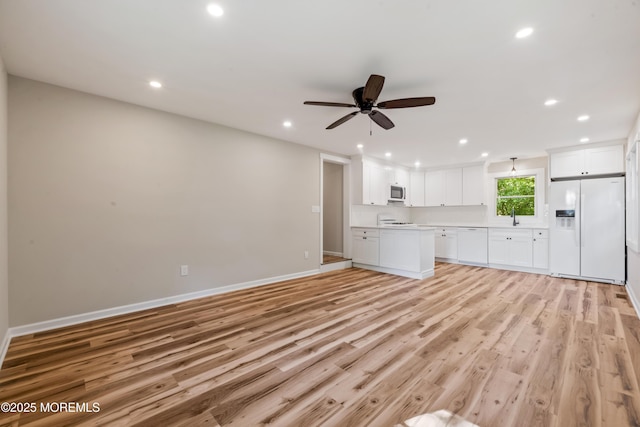 23 Bittner Rd, Millstone, NJ 08535 - unfurnished living room featuring recessed lighting, light wood-style flooring, and a ceiling fan