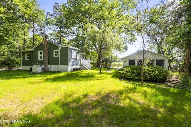 23 Bittner Rd, Millstone, NJ 08535 - view of green lawn featuring entry steps