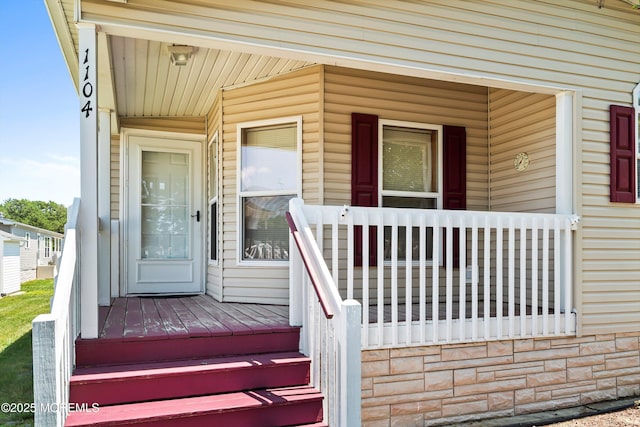 1104 Sycamore Ct, Whiting, NJ 08759 - view of exterior entry with a porch