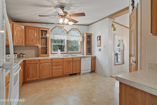 1104 Sycamore Ct, Whiting, NJ 08759 - kitchen featuring white appliances, ornamental molding, a ceiling fan, light countertops, and glass insert cabinets