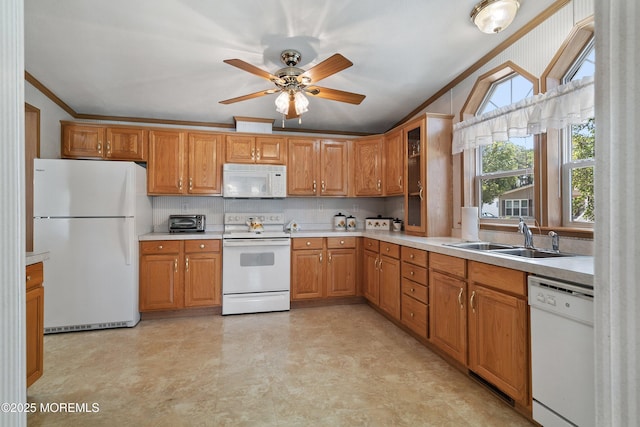1104 Sycamore Ct, Whiting, NJ 08759 - kitchen with white appliances, crown molding, light countertops, brown cabinetry, and ceiling fan
