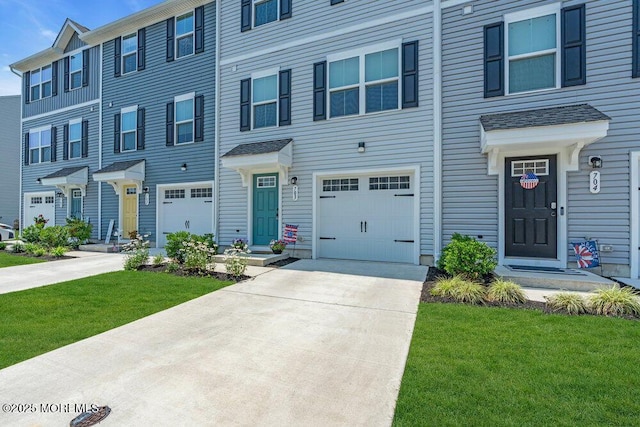 703 Cyprus Ct, Forked River, NJ 08731 - view of property featuring driveway, a garage, and a front lawn
