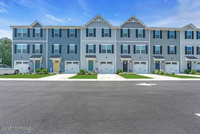 703 Cyprus Ct, Forked River, NJ 08731 - view of property with driveway and an attached garage