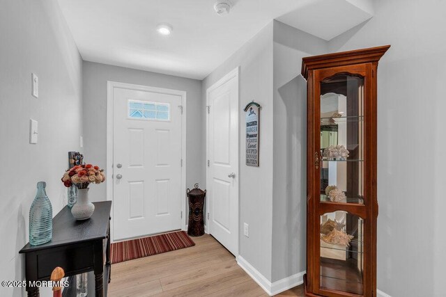 703 Cyprus Ct, Forked River, NJ 08731 - entryway featuring light wood finished floors and baseboards