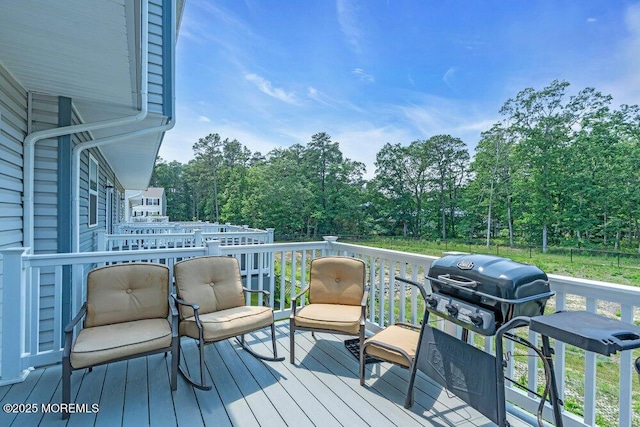 703 Cyprus Ct, Forked River, NJ 08731 - wooden deck featuring a grill and view of wooded area