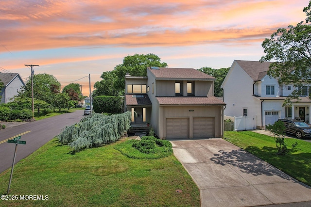 1120 Pennsylvania Ave, Manasquan, NJ 08736 - view of front of house featuring an attached garage, driveway, a shingled roof, and stucco siding