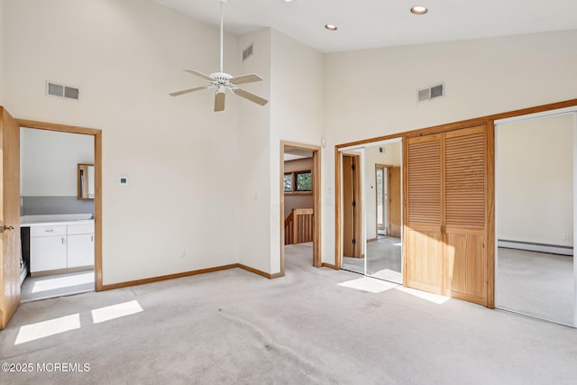 1120 Pennsylvania Ave, Manasquan, NJ 08736 - unfurnished bedroom featuring a baseboard radiator, carpet flooring, high vaulted ceiling, and recessed lighting