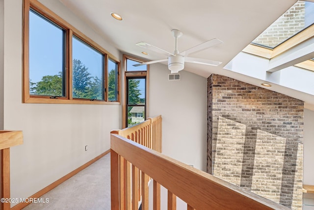 1120 Pennsylvania Ave, Manasquan, NJ 08736 - corridor with carpet floors, a skylight, an upstairs landing, lofted ceiling, and recessed lighting