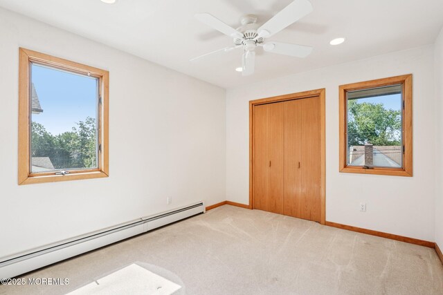 1120 Pennsylvania Ave, Manasquan, NJ 08736 - unfurnished bedroom featuring a baseboard radiator, carpet, a closet, recessed lighting, and a ceiling fan