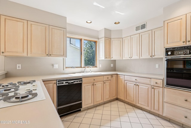 1120 Pennsylvania Ave, Manasquan, NJ 08736 - kitchen featuring black appliances, light brown cabinetry, light countertops, light tile patterned floors, and recessed lighting