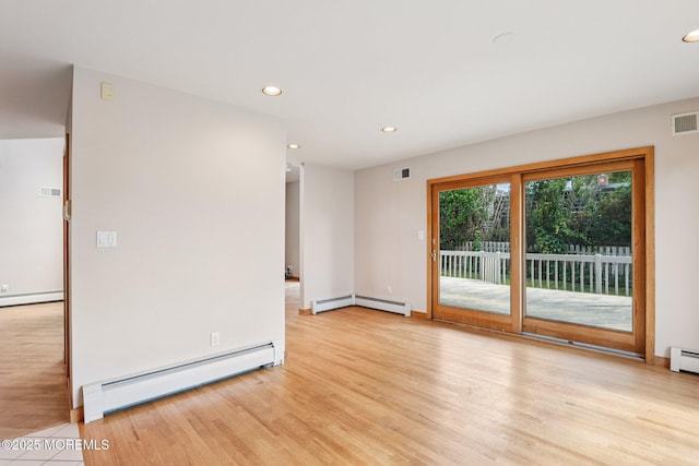 1120 Pennsylvania Ave, Manasquan, NJ 08736 - unfurnished room with a baseboard heating unit, light wood finished floors, and recessed lighting