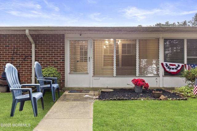 1034 Aberdeen Dr Unit E, Lakewood, NJ 08701 - doorway to property with a lawn